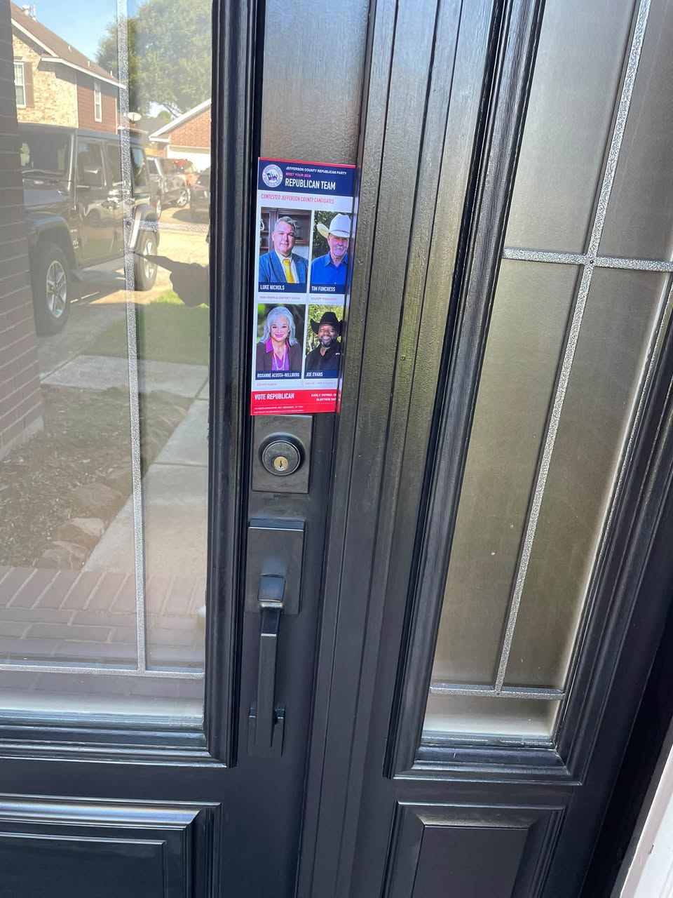 The October 10 block-walking team and outreach materials — photograph 4