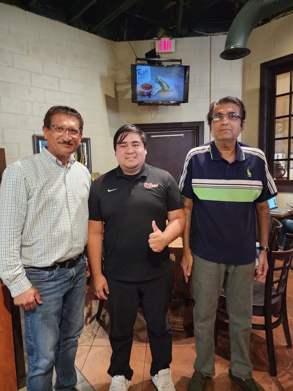 Tony Ashrafi with Ernesto Flores and another meeting participant