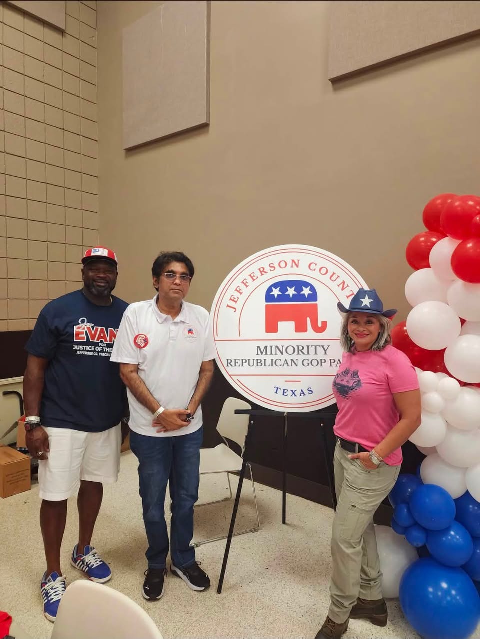 Friends beside the Jefferson County Minority Republican GOP PAC sign at Fiestas 58.